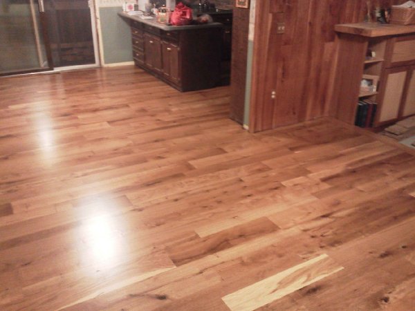 Flooring, paneling, mantel and beams all with our wood.