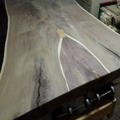 Use wood bow ties, epoxy, inlays, etc to enhance the surface
